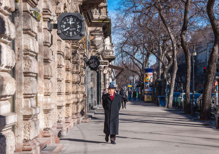 BUDAPEST, HUNGARY - FEBRUARY 22, 2016: A man walks along Andrassy Street in Budapestのeditorial素材