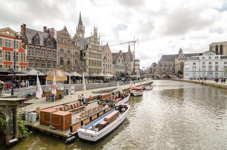 GHENT, BELGIUM - APRIL 16, 2017: Graslei is a quay and one of the most picturesque places in the historic city center of Ghent, Belgium, located on the right bank of the Leie river.のeditorial素材