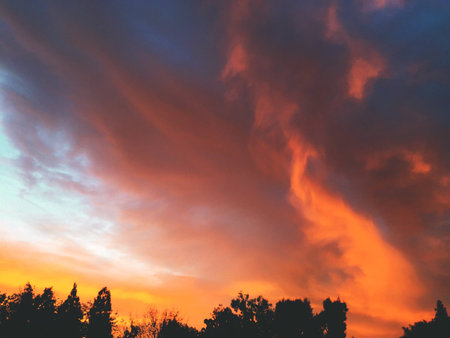 Fiery sky at sunset after storm.