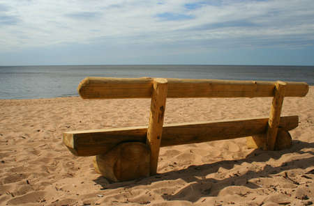 A summer day view with wooden bench on seaside Saulkrasti Latvia Europaの写真素材