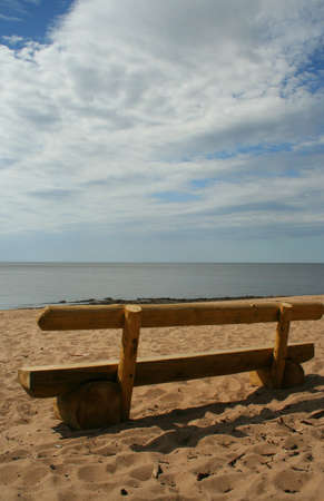 A summer day view with wooden bench on seaside Saulkrasti Latvia Europaの写真素材