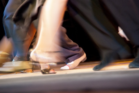 Dance moves and motion on salsa class  Milonga dance club - dancers performing an Argentinian tango の写真素材