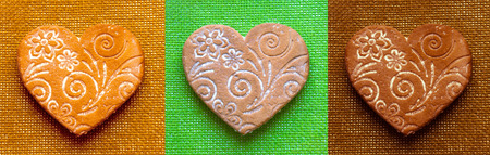 Holiday Gingerbread - bright hearts in retro style, sweet gifts for lovers. Colored hearts with vintage texture. Homemade sweet goodies for the Holidays on Valentine Day.の写真素材