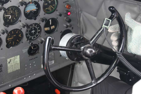 Cockpit steering of operational DC3 airplane with pilot hand