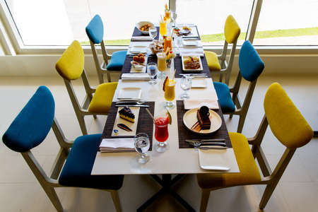 Table in the restaurant served for 6 people. Healthy food.
