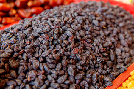 Seeds and dried fruits are sold on the marketの写真素材