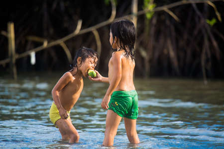Philippines, Cebu Island, May 21, 2020. Filipino children have fun at sea.のeditorial素材