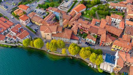Aerial view from the drone of the landscape of a small town on the shores of lake Como, Italy.の写真素材