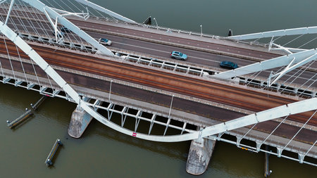 Aerial drone view of modern Enneus Heerma Bridge Amsterdam Netherlands.