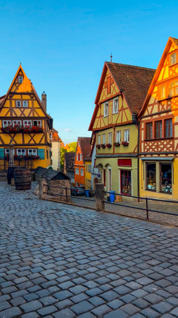 German traditional architecture half-timbered houses in historical center Rothenburg ob der Tauber, Bavaria, Middle Franconia, Germany, July 17, 2023.の写真素材