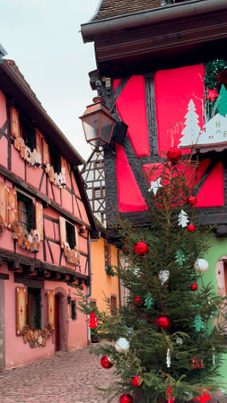 Christmas and New Year street decorations Christmas market Riquewihr or Reichenweier, Alsace, France December 25, 2023.の写真素材
