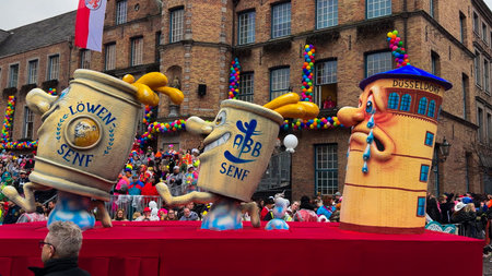 Colourful floats at Rosenmontag parade at carnival in Dusseldorf, North Rhine-Westphalia, Germany,...