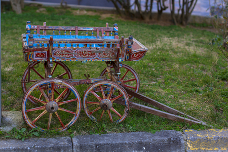Small wooden cart. Meadow in the villageの写真素材