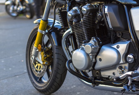 Shiny chrome motorcycle engine and forward tyre wheelの写真素材