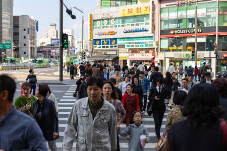 Seoul, South Korea - October 19, 2019: People cross the road. Busy intersection in the Yeongdeungpo area.のeditorial素材