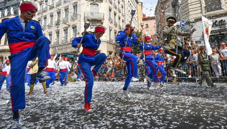 Lyon / France - September 16 2018: Biennial dance parade, colored groups parade in the streets of Lyonのeditorial素材