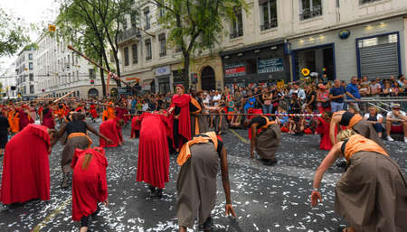 Lyon / France - September 16 2018: Biennial dance parade, colored groups parade in the streets of Lyonのeditorial素材