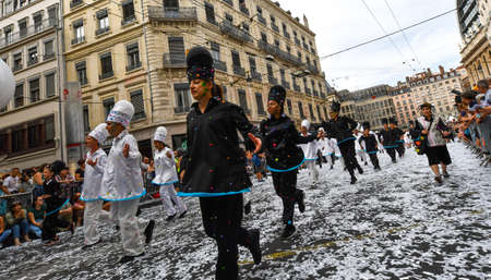 Lyon / France - September 16 2018: Biennial dance parade, colored groups parade in the streets of Lyonのeditorial素材