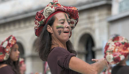 Lyon / France - September 16 2018: Biennial dance parade, colored groups parade in the streets of...