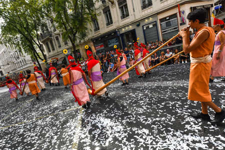 Lyon / France - September 16 2018: Biennial dance parade, colored groups parade in the streets of Lyonのeditorial素材