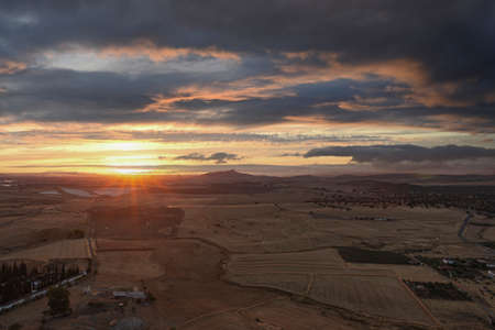 Small Andalusian town in southern Spain photographed from the top of a mountainの写真素材