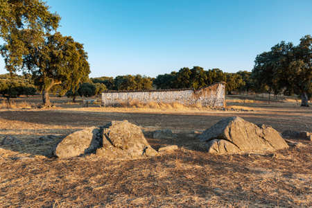 large stones on a farm at sunset in southern Andalusia, Spainの写真素材