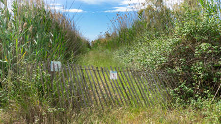 Wooden doors forbidding the passage natural park on the outskirts of the city of barcelona in spainの写真素材