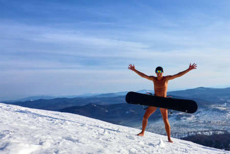 Undressed man standing in the snow. Sheregesh. Winter.の写真素材
