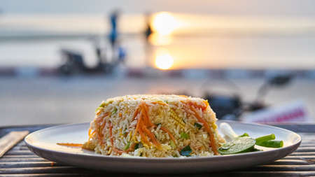 Rice with vegetables. Thai food. Sunset. Thailand.の写真素材