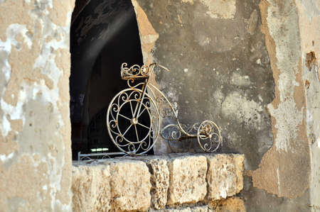 Metal bicycle, streets of old Jerusalem, Israel.の写真素材
