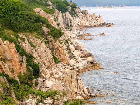 The rocky shore of the Japanese sea in Vrangel. The far east. Nakhodkaの写真素材