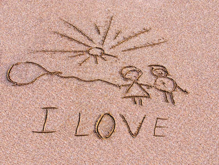 Inscription on sand I love