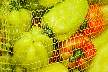colorful bell peppers, natural backgroundの写真素材