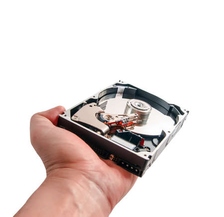 hard disk in hand isolated on a white backgroundの写真素材