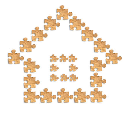image of a house made of wooden figures puzzles with Clipping Pathの写真素材