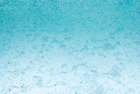 closeup of bubbles in blue water
