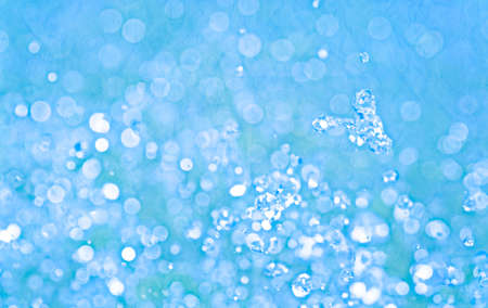 closeup of bubbles in blue waterの写真素材