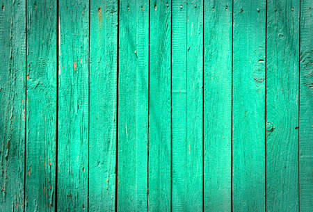 old green wooden fence backgroundの写真素材