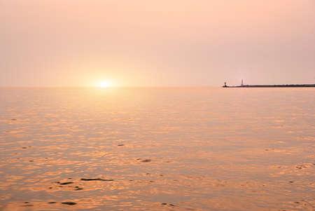 Beautiful seascape with orange warm sunrise, vacation conceptのeditorial素材