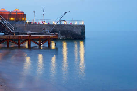Navy Pier at night in coming beams of the sunのeditorial素材
