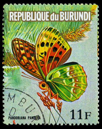 REPUBLIC OF BURUNDI - CIRCA 1974: A stamp printed in Republic of Burundi shows a butterfly Pandoriana Pandora, series, circa 1974のeditorial素材
