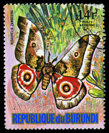 REPUBLIC OF BURUNDI - CIRCA 1974: A stamp printed in Burundi shows a butterfly Nudaurelia Zambesina, series, circa 1974のeditorial素材