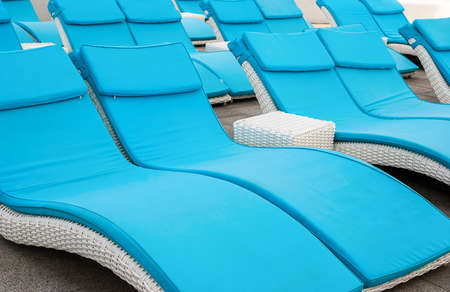 empty beach couches at the beachの写真素材