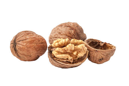 walnut and a cracked walnut isolated on the white background