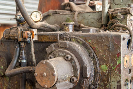 A piece of old and rusty machinery