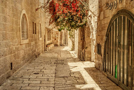 Ancient Alley in Jewish Quarter, Jerusalem. Israel. Photo in old color image style. Ancient Alley in Jewish Quarter, Jerusalem. Israel. Photo in old color image style.