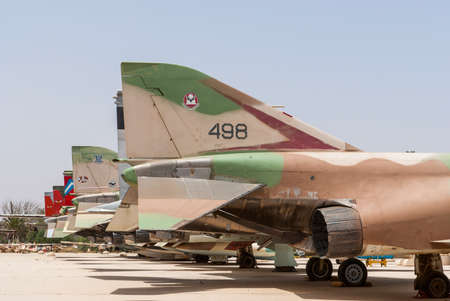 HATZERIM, ISRAEL - APRIL 27, 2015: Multiple types of military jets which served in IAF are displayed in Israeli Air Force Museum in Hatzerim, Israelのeditorial素材