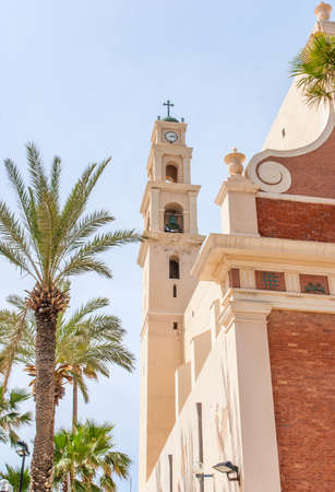 St. Peter's Church. The bell tower with clock of the Church. Jaffa, Israelの写真素材