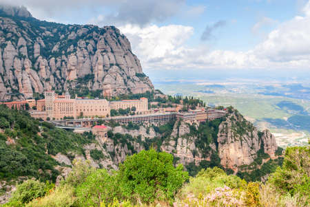 Santa Maria de Montserrat Abbey in Monistrol de Montserrat, Catalonia, Spain. Famous for the Virgin of Montserrat.の写真素材