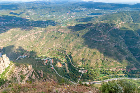 Breathtaking view to Montserrat mountain range on a sunny summer day near Barcelona, Catalonia, Spainの写真素材